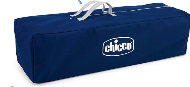 Cuna de viaje y colchón.