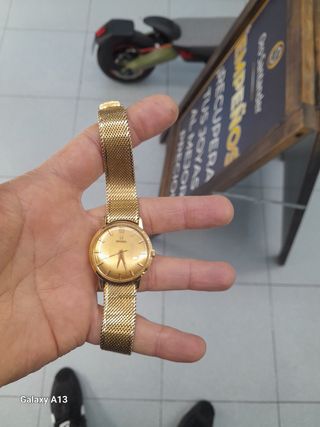 omega de oro 18k
