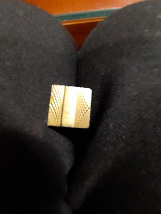 Gemelos y pilla corbatas bañados