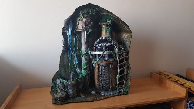 Casa con luces realizada a mano