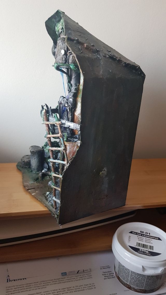 Casa con luces realizada a mano