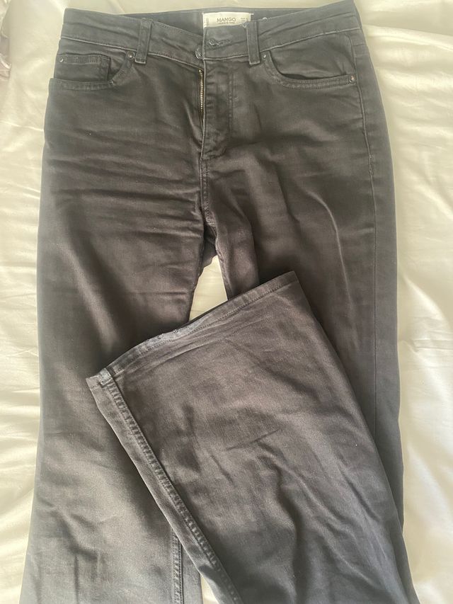 Vaqueros negros campana