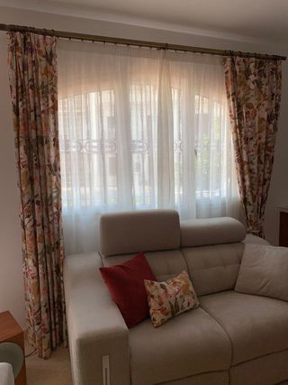 Juego de cortinas y cojines