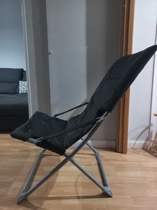 Silla plegable de tela.