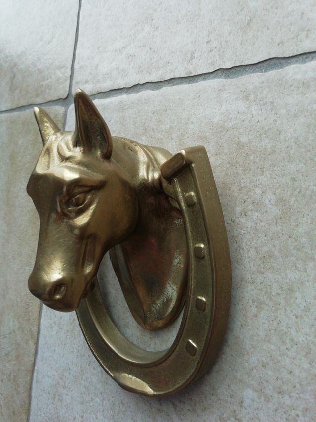 Battiporta testa e ferro cavallo