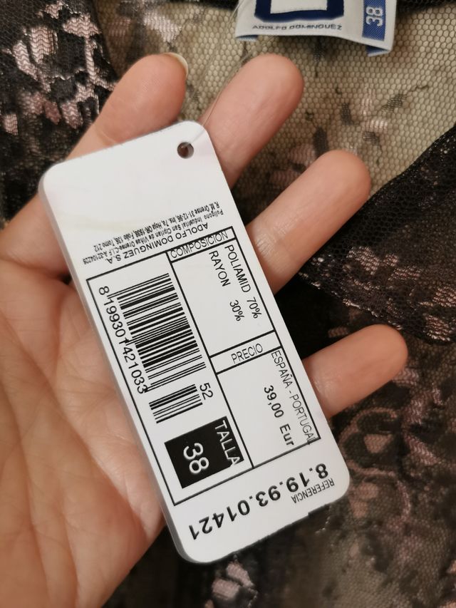 Blusa transparente talla 38 de Adolfo Domínguez .