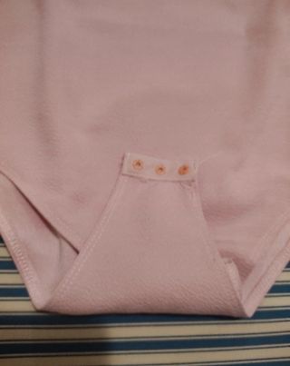 Body rosa palo con volantes. Shein.