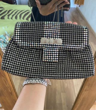 Bolso cóctel brillante con lazo El Corte Inglés