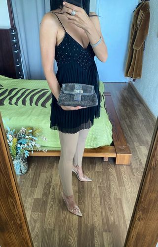 Bolso cóctel brillante con lazo El Corte Inglés