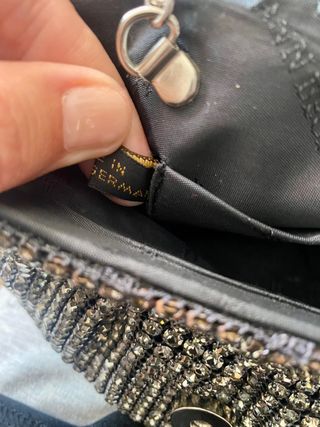 Bolso cóctel brillante con lazo El Corte Inglés
