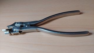 Herramienta reparación de pianos.