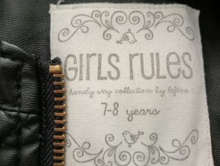 Cazadora polipiel negra niña