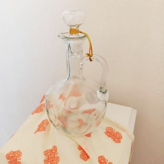 Antigua aceitera de cristal