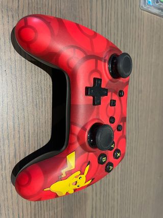Nintendo Switch, mando inalambrico y varios juegos