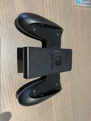 Nintendo Switch, mando inalambrico y varios juegos