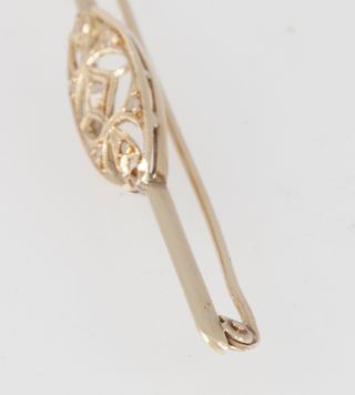 Broche antiguo en oro amarillo 18k y brillantes