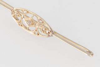 Broche antiguo en oro amarillo 18k y brillantes