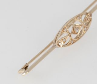 Broche antiguo en oro amarillo 18k y brillantes