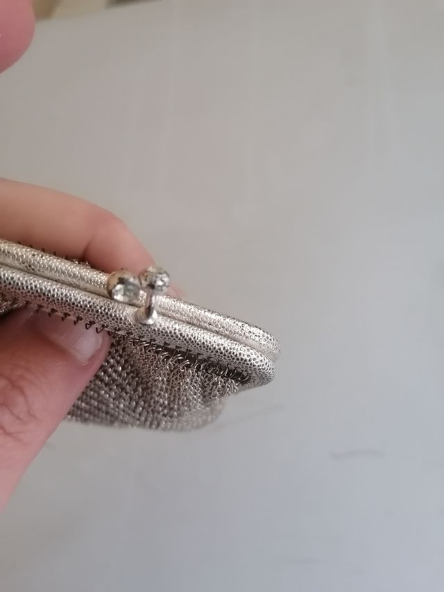 antico portamonete in metallo