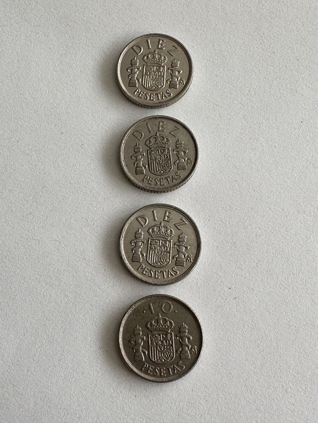 Monedas: 4 monedas de 10 pts de distintos años.