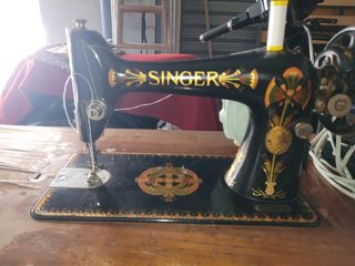 Máquina de coser Singer conpleta