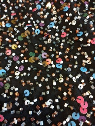 chaqueta de fiesta negra con lentejuelas