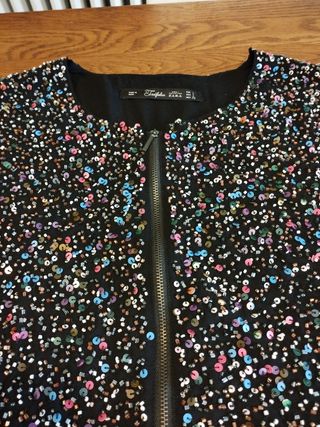 chaqueta de fiesta negra con lentejuelas