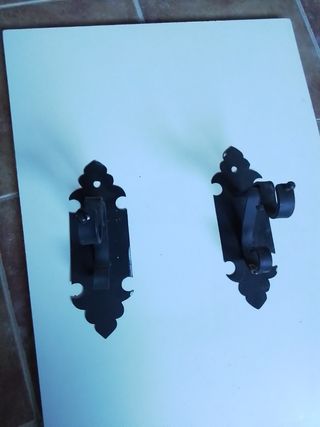 sujeta barra cortina castellano