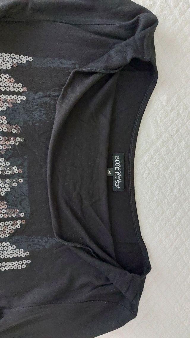 Maglia lunga asimmetrica