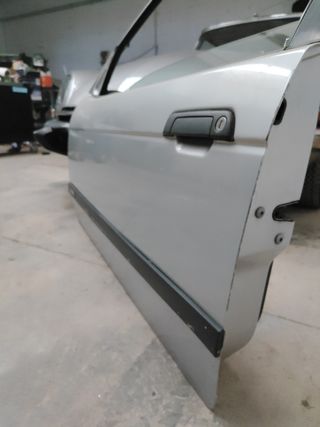 Puerta izq. e36 compact BMW