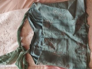 elegante top de tintorero en verde agua