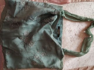 elegante top de tintorero en verde agua