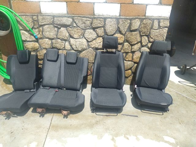 asientos suzuki swift 2006
