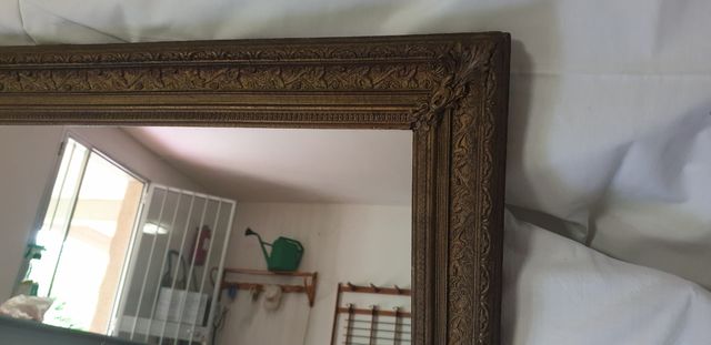 specchio con cornice in legno dotata antica