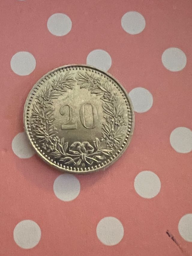 20 peniques UK 1982 y 20 céntimos suizos 2001