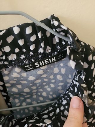 Blusa azul marino lunares