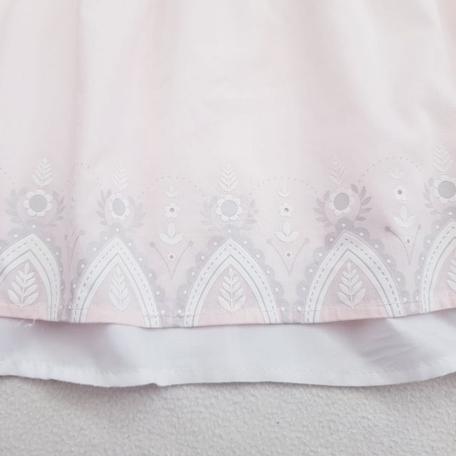 Conjunto blusón babero rosa bermuda blanca Gemelas