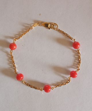 Pulsera Oro de 18 Klt con corales. 