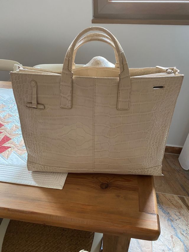 Cartera de piel porta-documentos Piquadro.