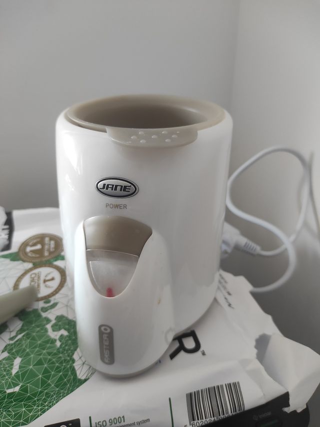 calienta biberones y potitos casa-coche