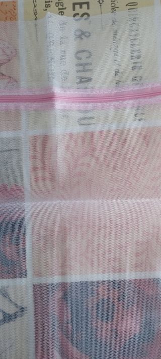 Bolsa de lavandería de malla blanca nueva