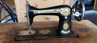 Maquina de coser singer