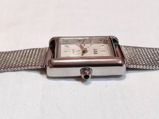 Reloj vintage 80’s malla plateada rectangular