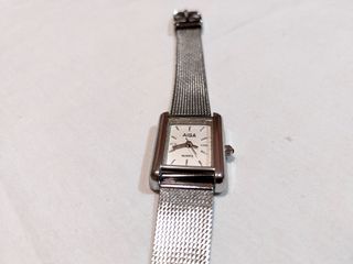 Reloj vintage 80’s malla plateada rectangular