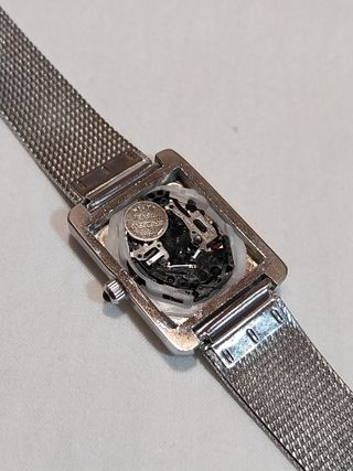 Reloj vintage 80’s malla plateada rectangular