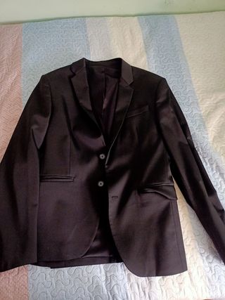 Traje
