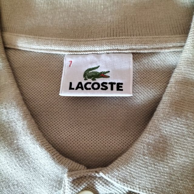 Polo Lacoste color beige-marrón claro
