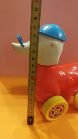 Juguete Perro plástico soplado ruedas