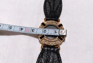 Reloj vintage 80´s bisel dorado correa cuero negra