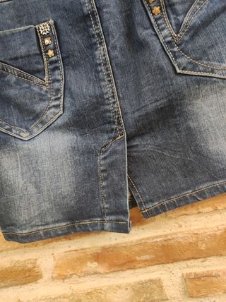 MINIFALDA  V A Q U E R A   AZUL  LAVADO